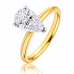 Gold ring with a pear-shaped lab grown diamond on a white background at LeGassick.