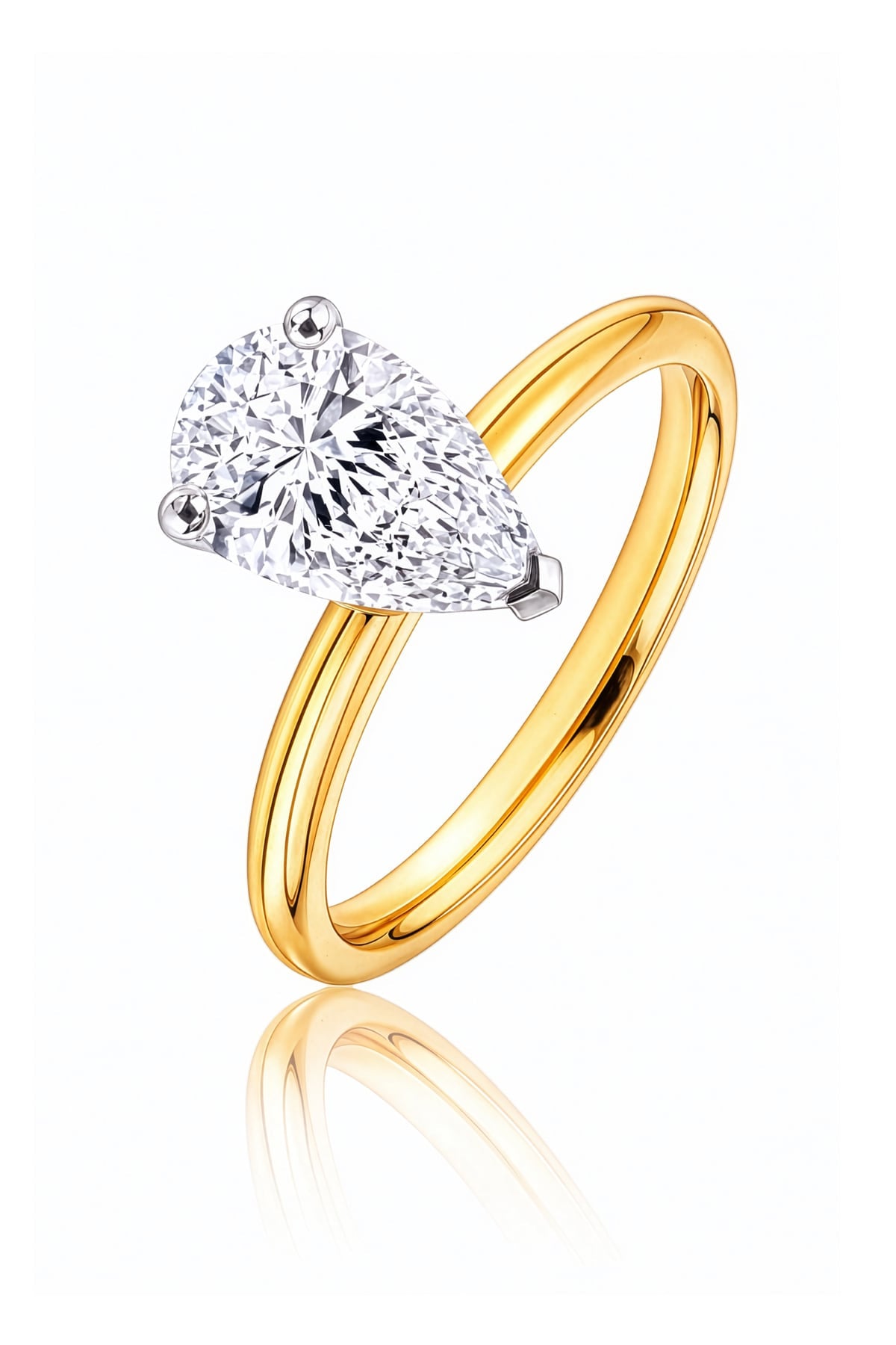 Gold ring with a pear-shaped lab grown diamond on a white background at LeGassick.