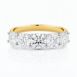 Gold ring with five lab created diamonds on a white background at LeGassick, Gold Coast, Australia.