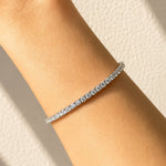 Lab grown diamond tennis bracelet in white gold on a lady's wrist at LeGassick, Gold Coast, Australia.