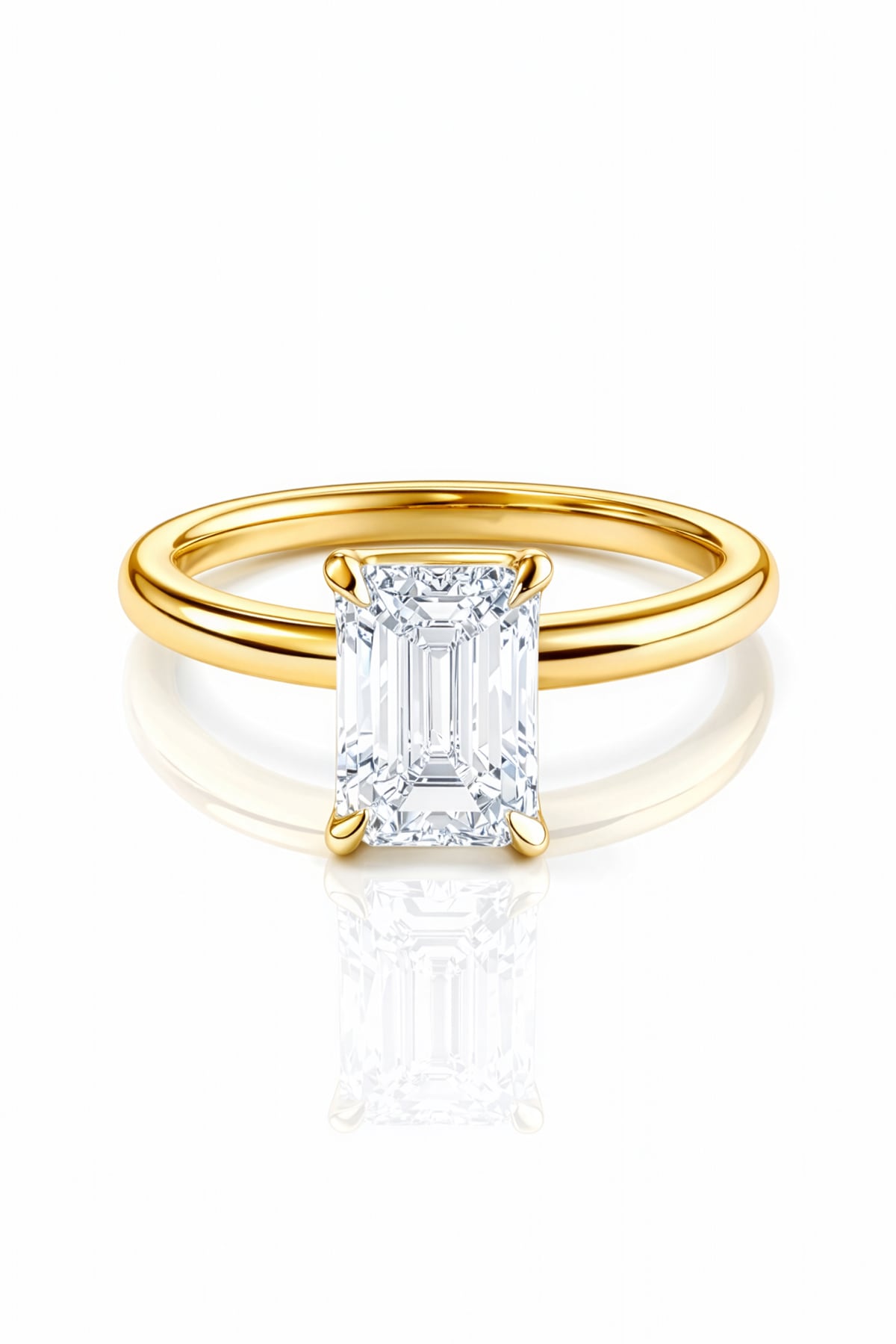 Gold ring with a large lab grown emerald cut diamond on a white background at LeGassick, Gold Coast, Australia.