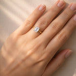 Gold ring with a large lab grown emerald cut diamond on a lady's hand at LeGassick, Gold Coast, Australia.