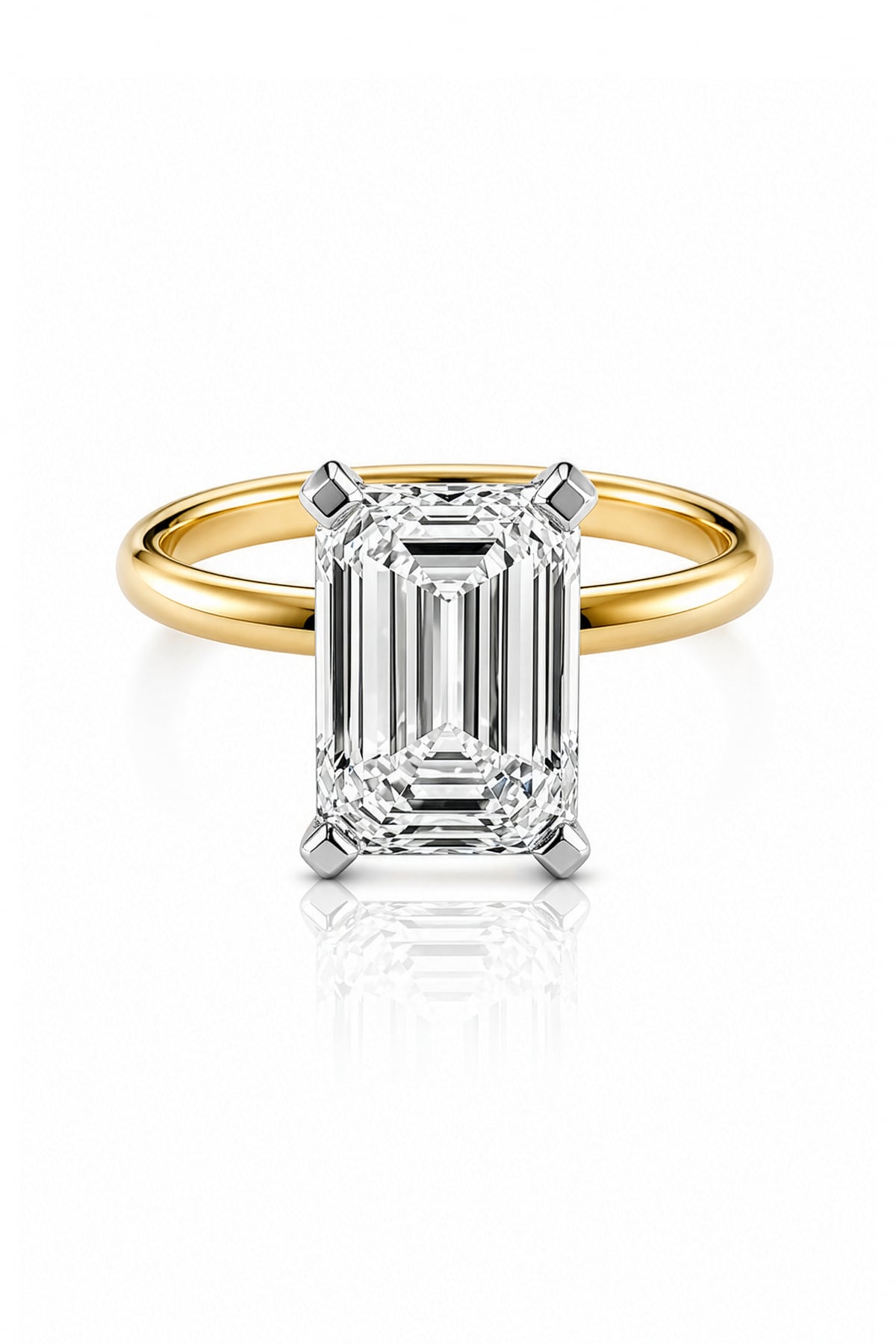 Gold ring with a large emerald-cut lab diamond on a white background