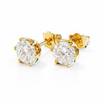 Gold lab diamond stud earrings on a white background
