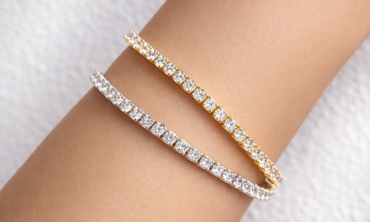 Yellow and white gold lab grown diamond tennis bracelets on a woman's wrist at LeGassick, Gold Coast, Australia.