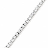 A close-up diagonal view of a white gold tennis bracelet paved with round clear lab diamonds on a plain white background.