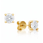 Gold stud earrings with clear lab grown diamonds on a white background at LeGassick, Gold Coast, Australia.