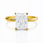 Gold ring with a large lab diamond on a white background at LeGassick.