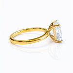 Gold ring with a large lab diamond on a white background at LeGassick.