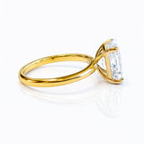 Gold ring with a large lab diamond on a white background at LeGassick.