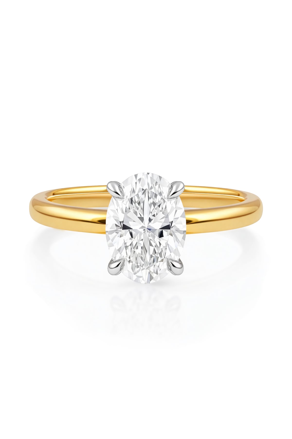 Gold ring with a lab grown diamond on a white background at LeGassick.