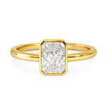 Gold ring with a rectangular diamond on a white background at LeGassick Gold Coast, Australia.