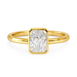 Gold ring with a rectangular diamond on a white background at LeGassick Gold Coast, Australia.