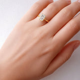 Gold ring with a rectangular diamond on a lady's hand at LeGassick Gold Coast, Australia.
