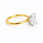 Gold ring with a large diamond on a white background at LeGassick, Gold Coast, Australia.
