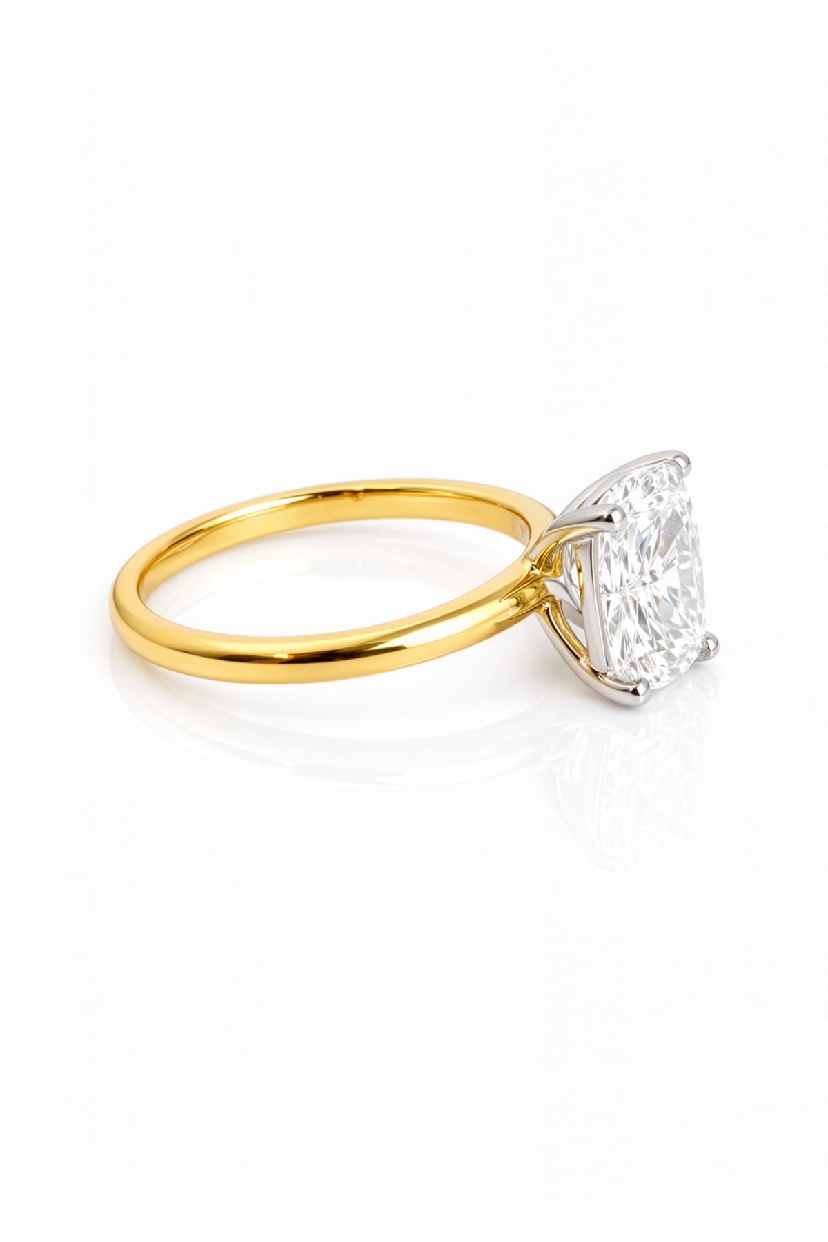 Gold ring with a large diamond on a white background at LeGassick, Gold Coast, Australia.