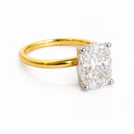 Gold ring with a large diamond on a white background at LeGassick, Gold Coast, Australia.
