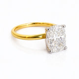 Gold ring with a large diamond on a white background at LeGassick, Gold Coast, Australia.