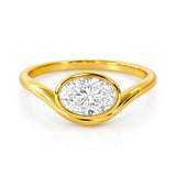 Gold ring with an oval lab grown diamond on a white background at LeGassick, Gold Coast, Australia.