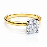 Gold ring with a lab grown diamond on a white background at LeGassick, Gold Coast, Australia.