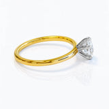 Gold ring with a lab grown diamond solitaire on a white background at LeGassick, Gold Coast, Australia.
