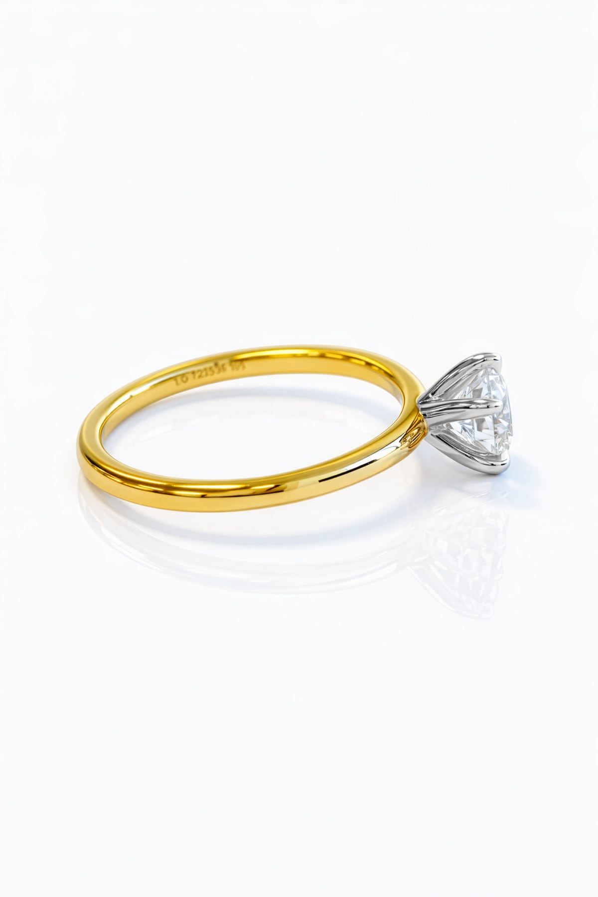 Gold ring with a lab grown diamond solitaire on a white background at LeGassick, Gold Coast, Australia.