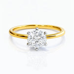 Gold ring with a lab grown solitaire diamond on a white background at LeGassick, Gold Coast, Australia.