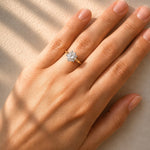 Gold ring with a lab grown solitaire diamond on a lady's hand at LeGassick, Gold Coast, Australia.