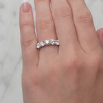 Gold ring with 5 lab grown diamonds on a lady's hand at LeGassick, Gold Coast, Australia.