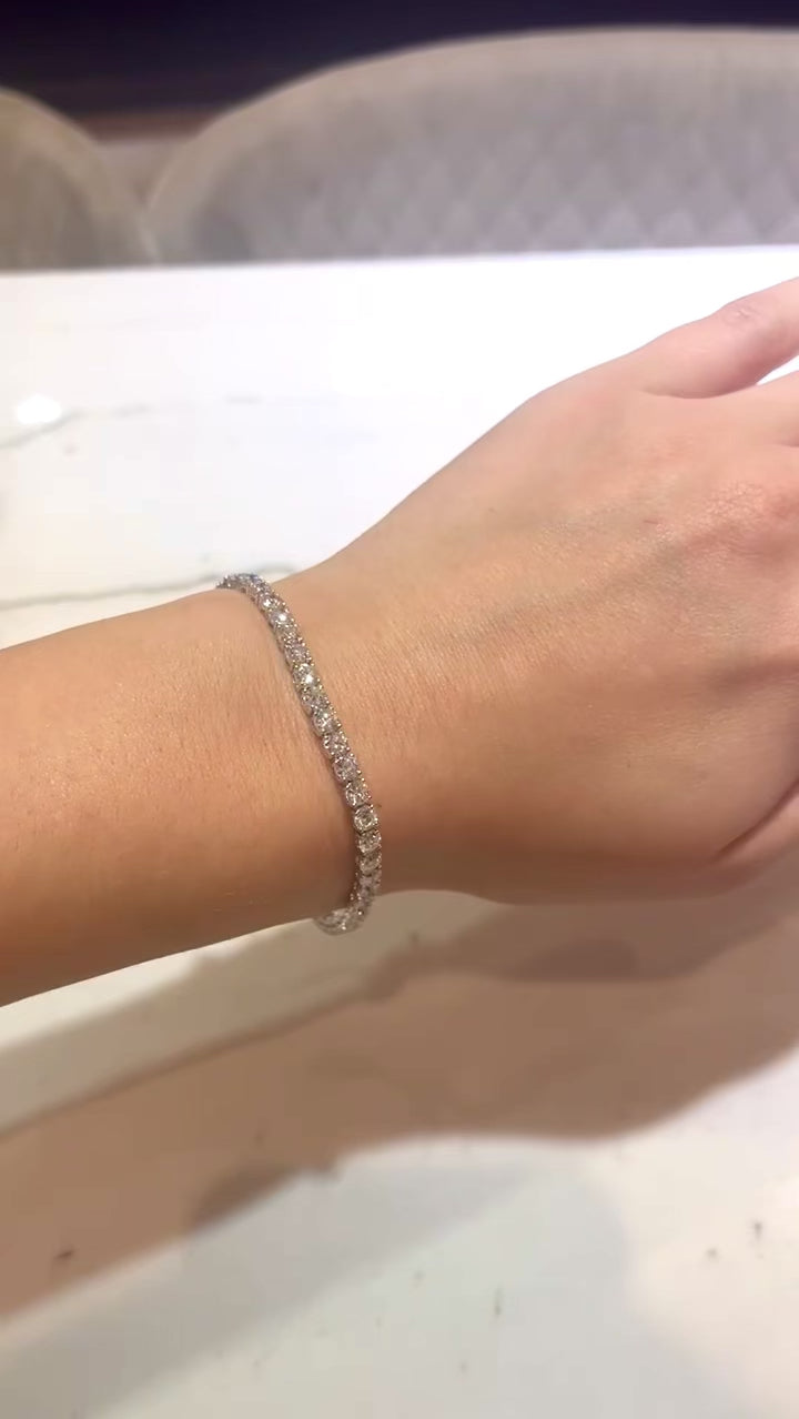Lab grown diamond tennis bracelet in white gold on a lady's wrist at LeGassick, Gold Coast, Australia.