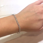 Lab grown diamond tennis bracelet in white gold on a lady's wrist at LeGassick, Gold Coast, Australia.