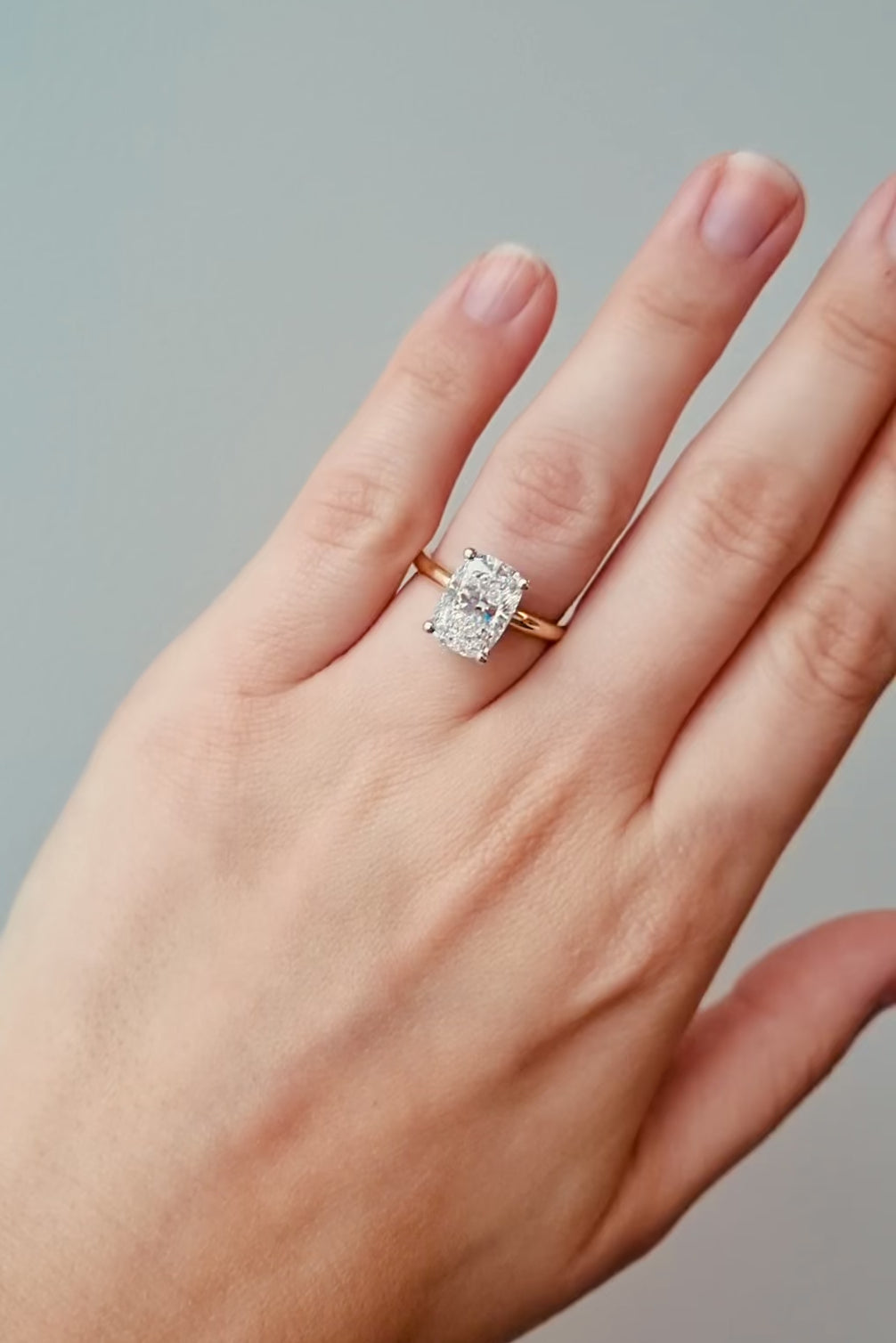 Gold ring with a large diamond on a lady's hand at LeGassick, Gold Coast, Australia.
