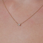 Gold necklace with a lab grown diamond pendant on a person's neck, at LeGassick, Gold Coast, Australia.