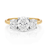 Gold ring with three lab grown diamonds on a white background