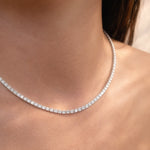 Close-up of a lab diamond collier necklace on a person's neck at LeGassick.